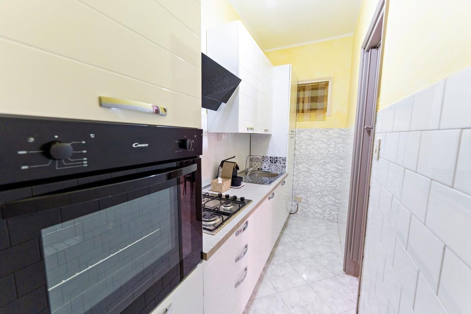 Kitchen or kitchenette, oven, stove