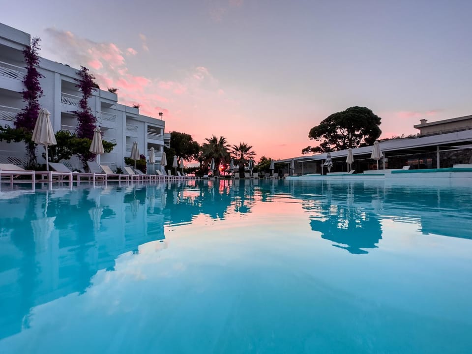 Property building, Swimming pool, Sunset