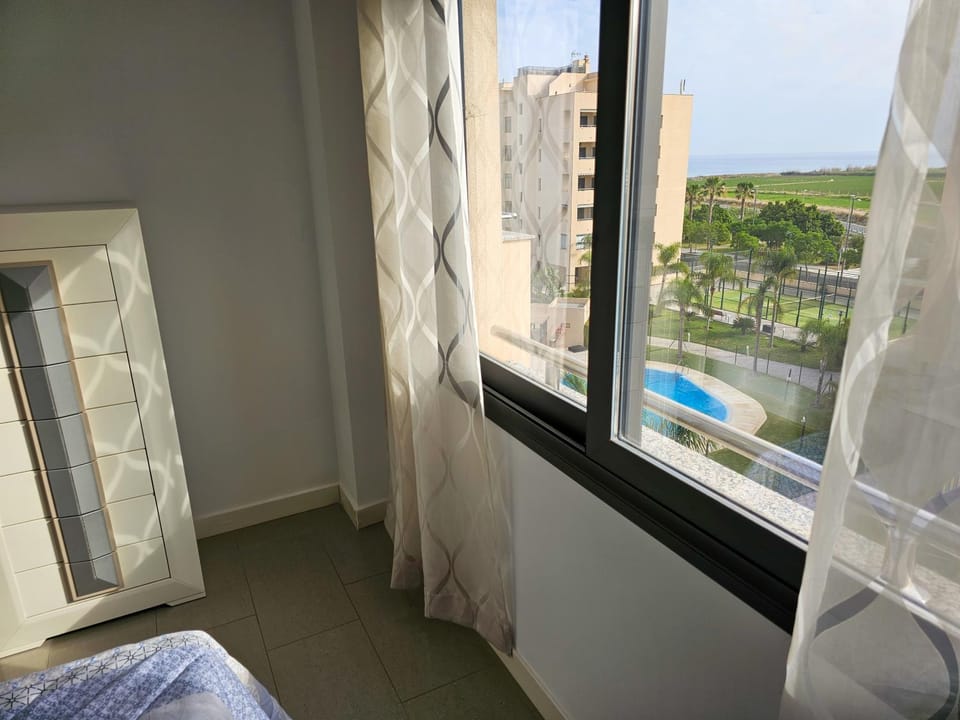 View (from property/room), Pool view, Sea view, Swimming pool