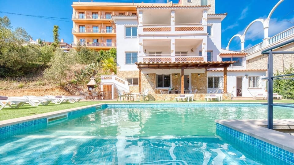Property building, Living room, Swimming pool