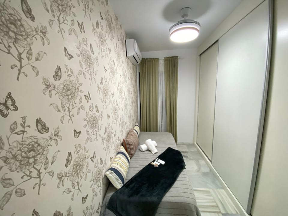 Bed, Photo of the whole room, Bedroom, towels, air conditioner