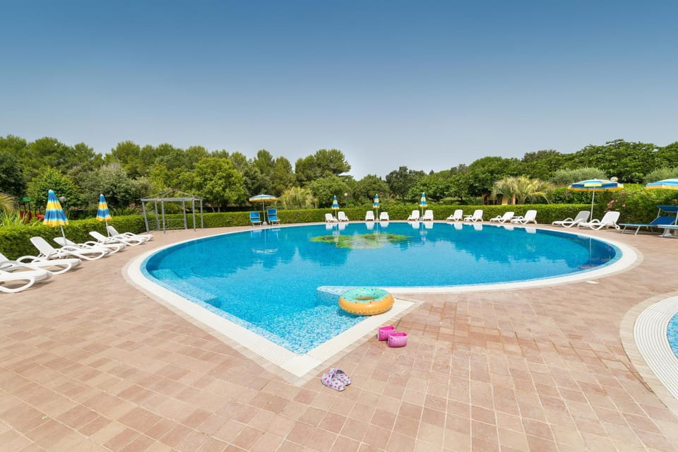 Property building, Living room, Swimming pool