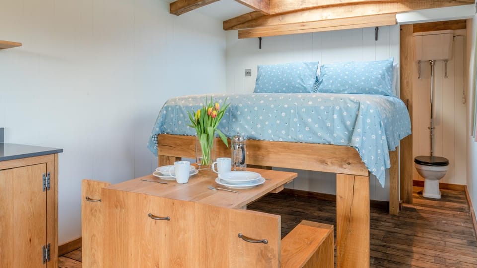 Bed, Bathroom, Dining area