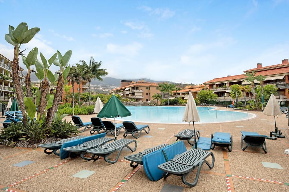 Property building, Living room, Swimming pool