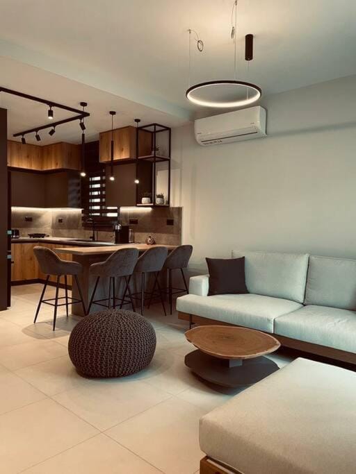 Kitchen or kitchenette, Living room, Seating area, Dining area