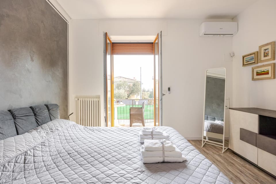 Bed, Photo of the whole room, Bedroom, towels, air conditioner