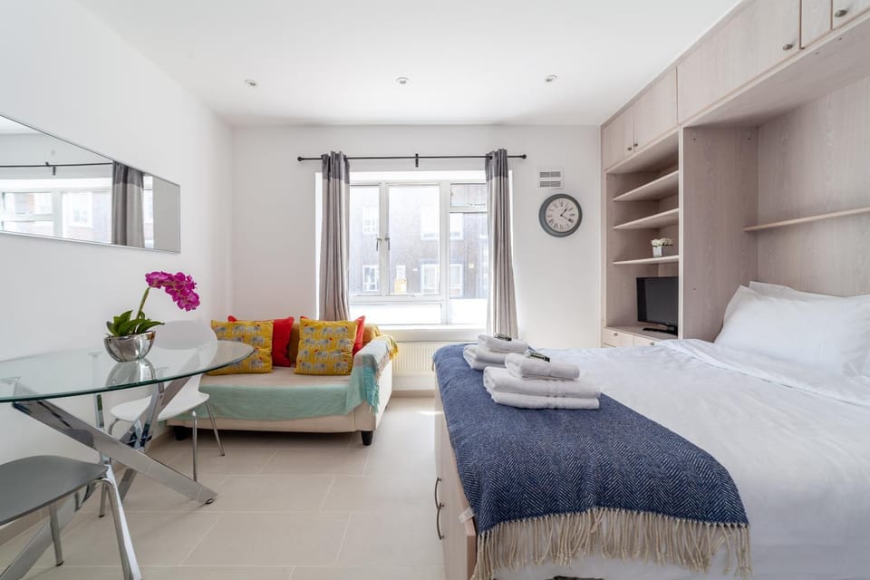 Bed, Living room, Seating area, Bedroom, towels, wardrobe
