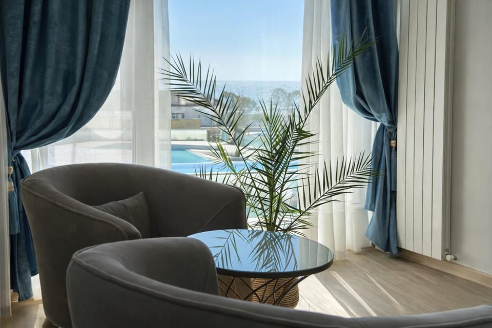 Natural landscape, Living room, Seating area, Pool view, Sea view, Swimming pool