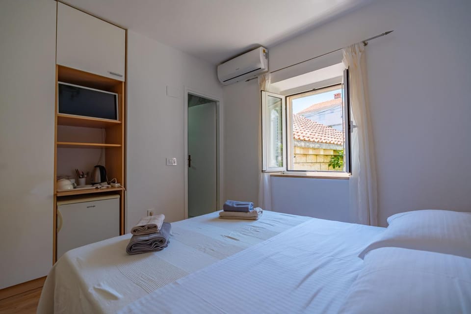Bed, Photo of the whole room, Bedroom, towels, wardrobe, air conditioner