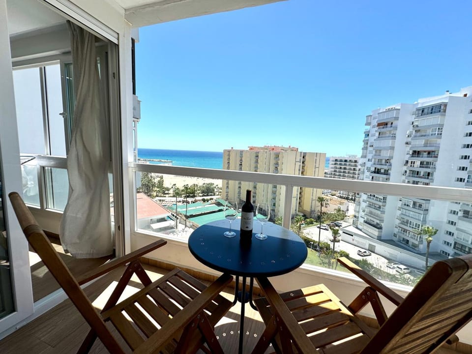 Property building, Patio, Day, View (from property/room), Balcony/Terrace, Living room, Seating area, Dining area, City view, Sea view