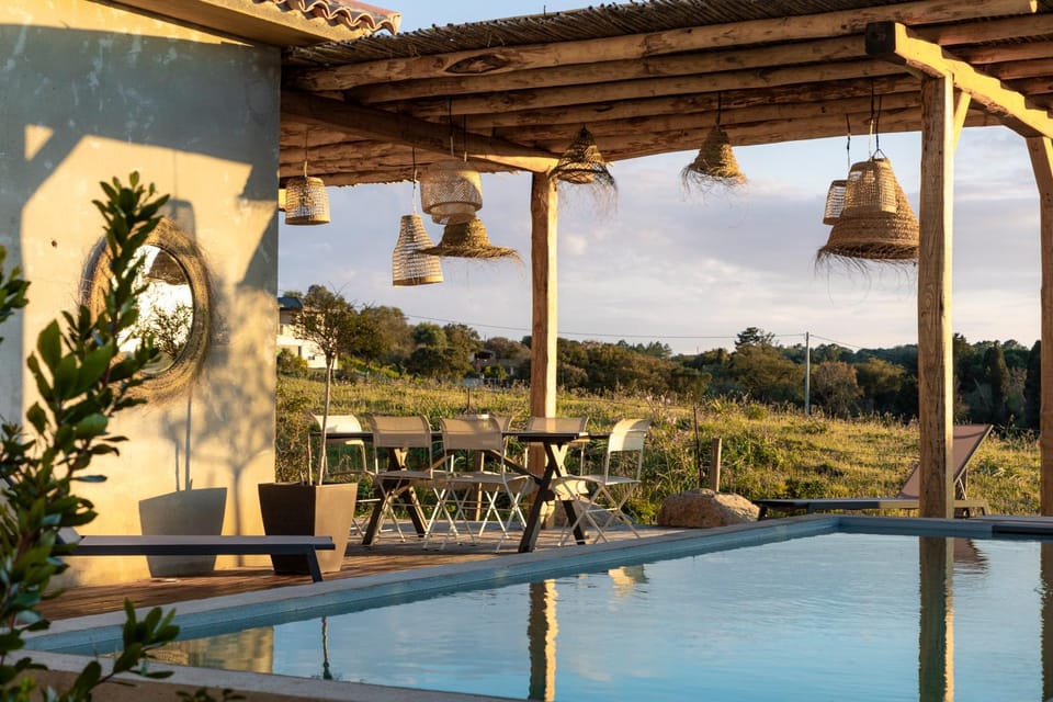 Patio, Day, Natural landscape, Pool view, Swimming pool, sunbed