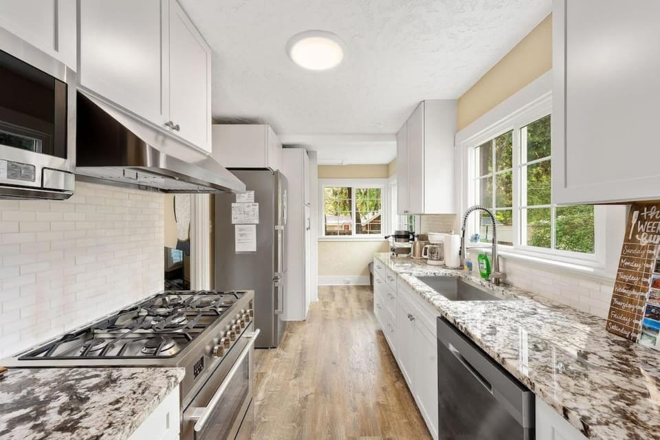 Kitchen or kitchenette, dishwasher, microwave, oven, stove, toaster, kitchen