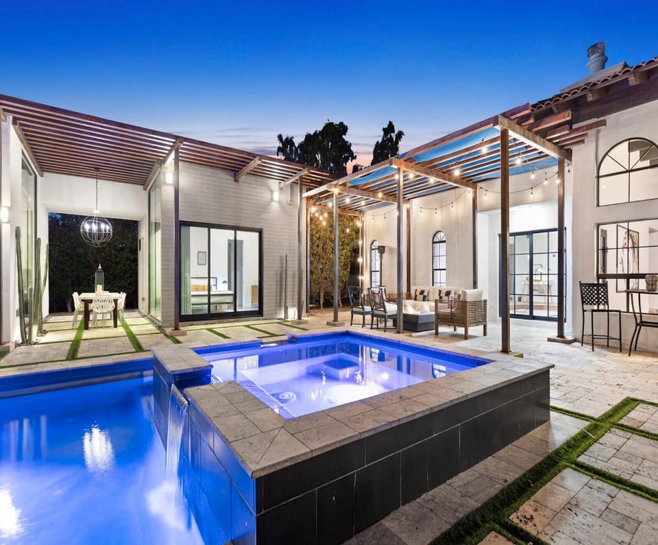 Property building, Patio, Night, Pool view, Swimming pool, sunbed