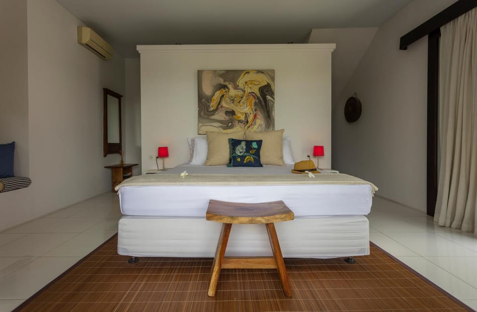 Bed, Decorative detail, Seating area, Bedroom, air conditioner