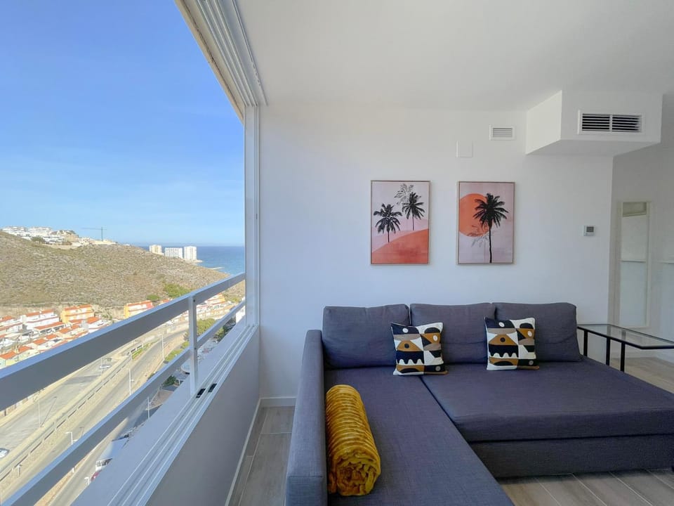 Natural landscape, View (from property/room), Living room, Seating area, Sea view