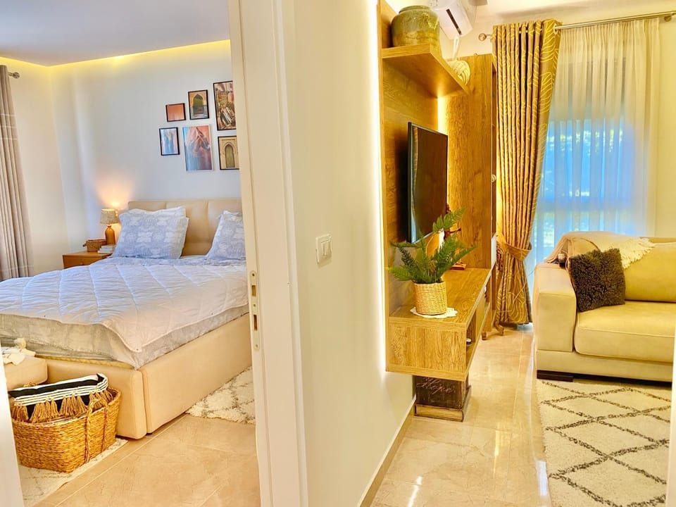 Bed, Living room, Seating area, Bedroom