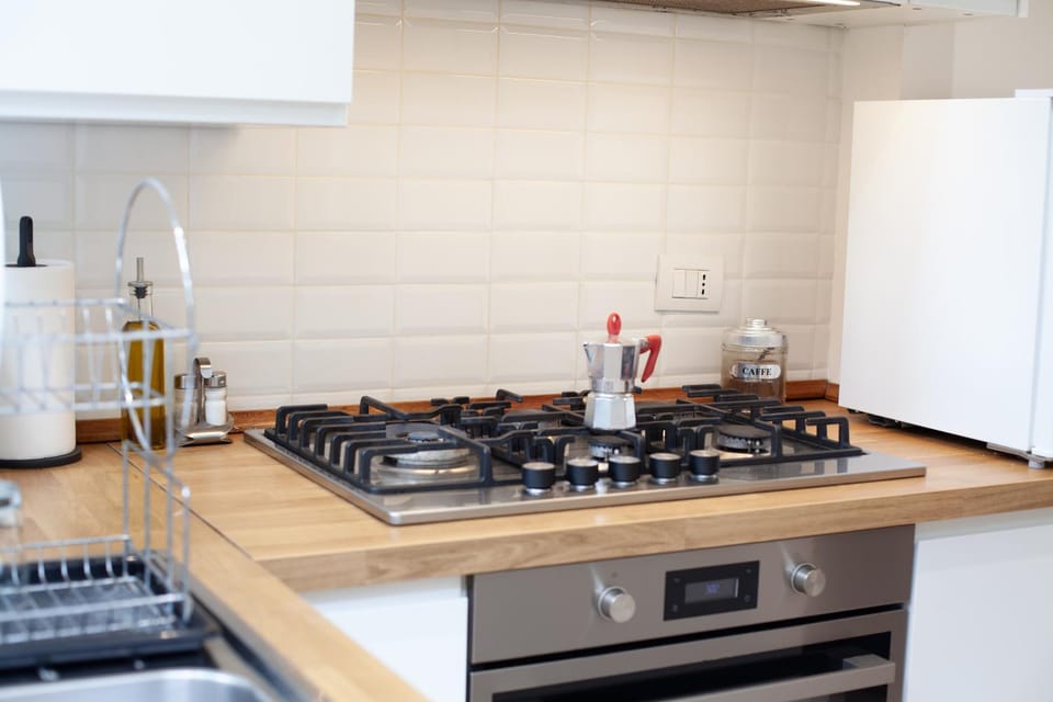 Kitchen or kitchenette, stove