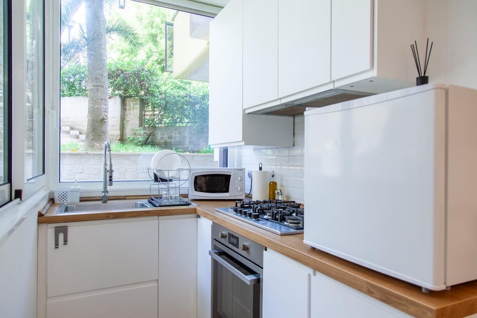 Kitchen or kitchenette, oven, stove