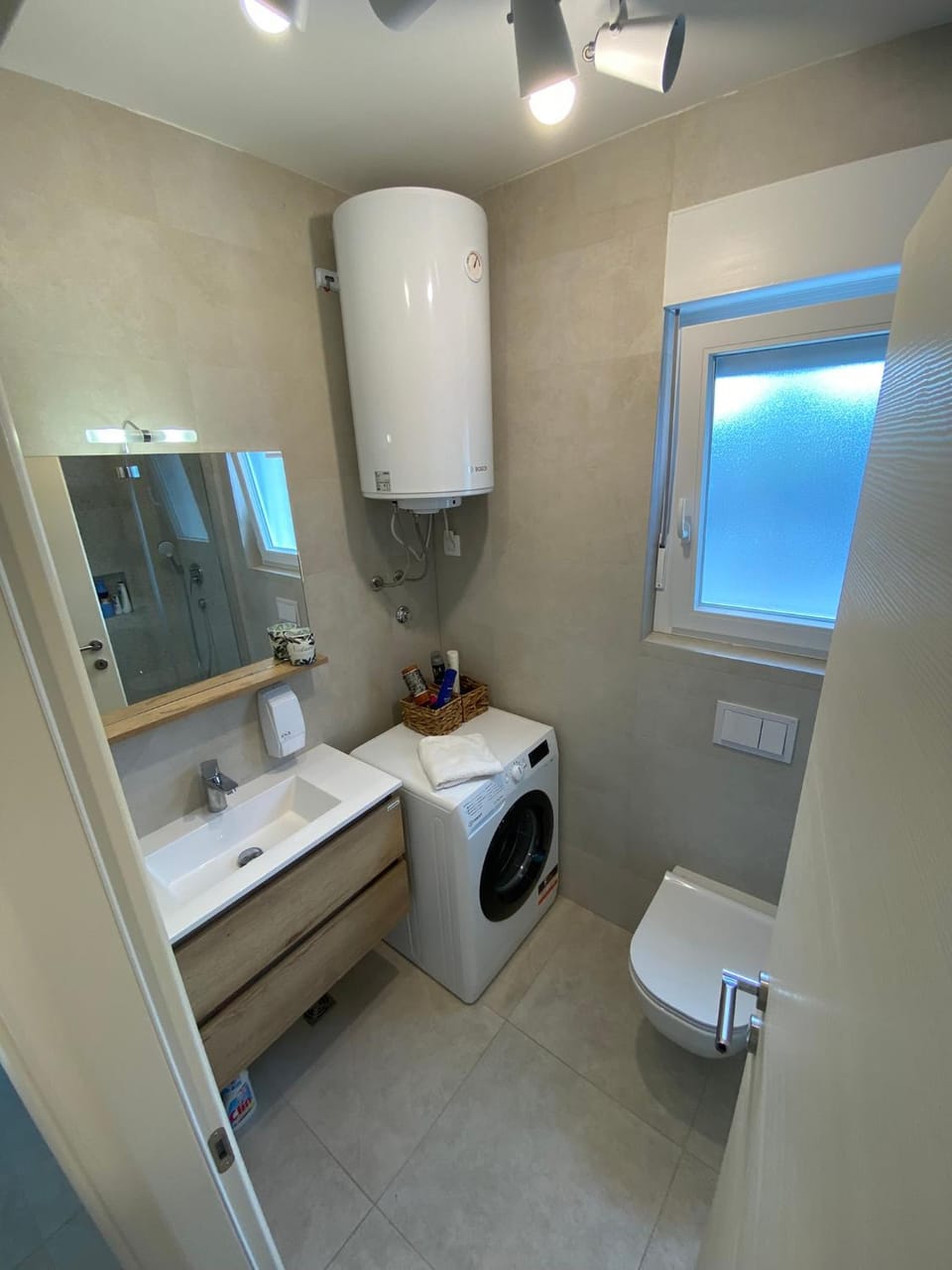 Shower, Toilet, Bathroom, towels, washing machine, dryer