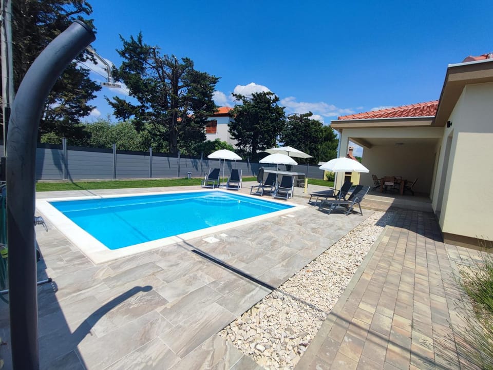 Patio, Day, Balcony/Terrace, Pool view, Swimming pool, sunbed