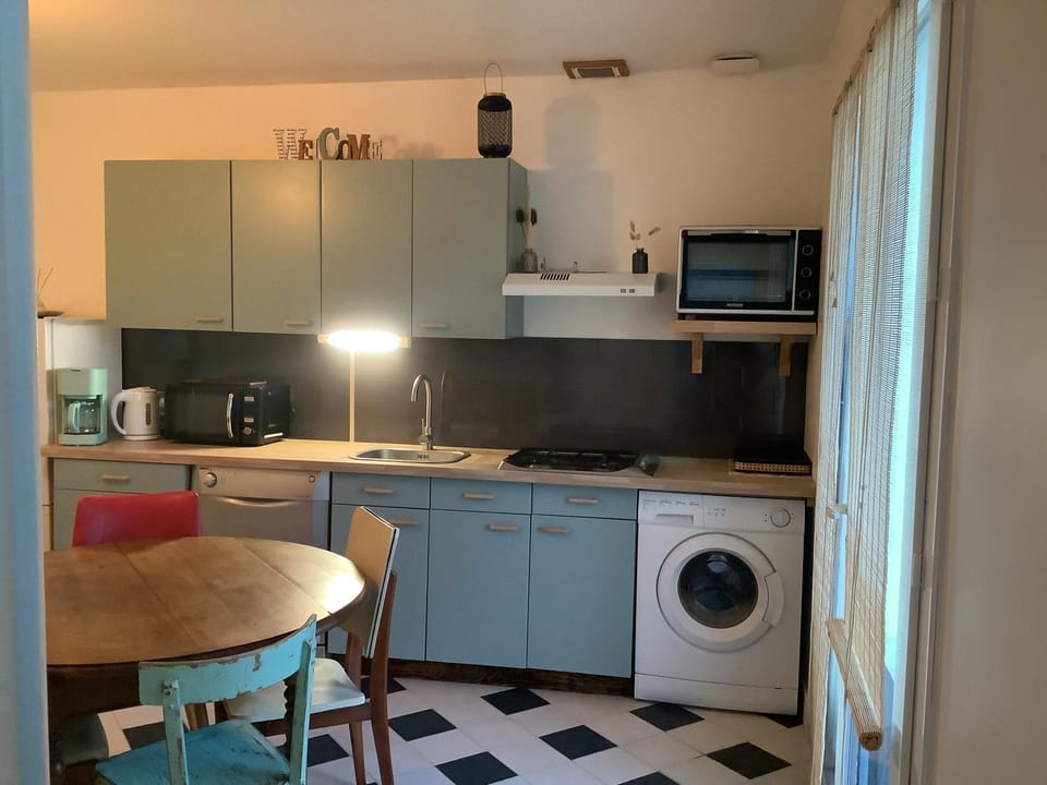Kitchen or kitchenette, stove