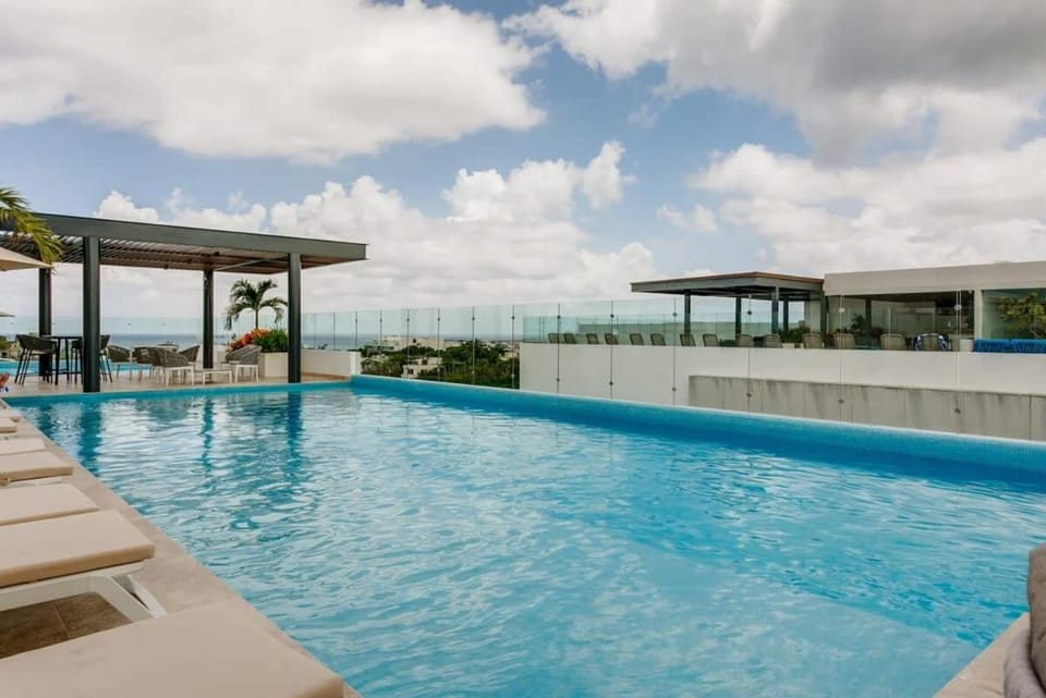 New Condo Roof Pool with Gym and WiFi near 5th half Blk Kids Ok House in Playa del Carmen