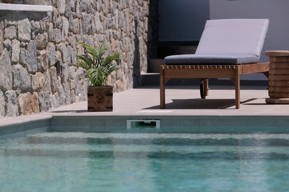 Property building, Decorative detail, Swimming pool, sunbed