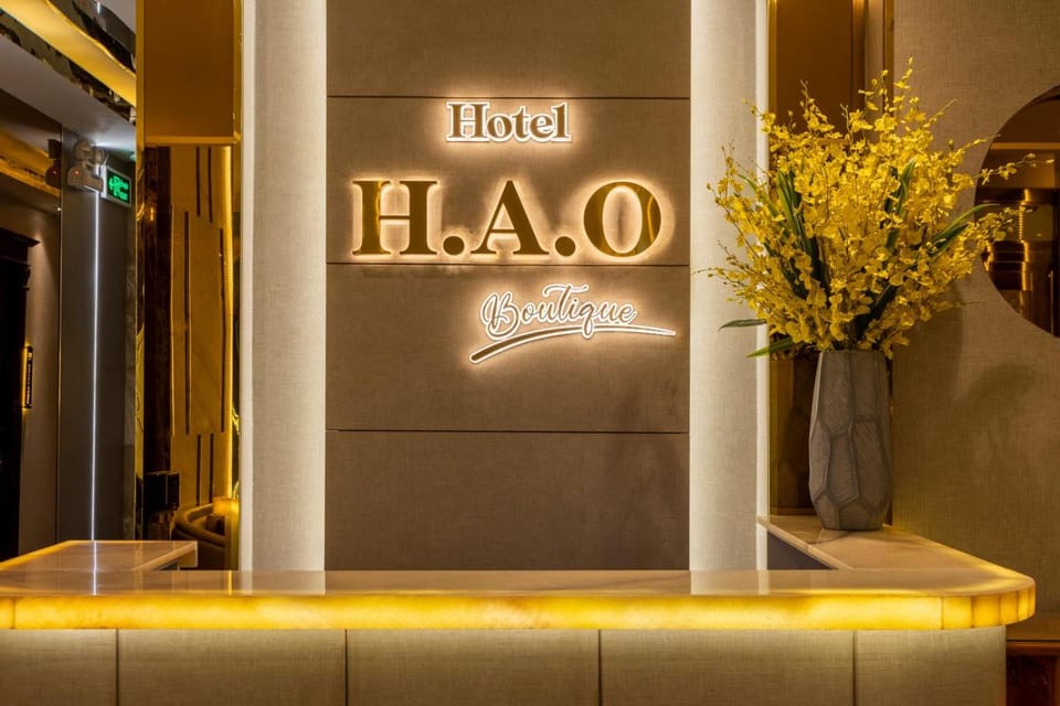 Communal lounge/ TV room, Property logo or sign, Lobby or reception, Logo/Certificate/Sign, Text overlay, Certificate/Award, concierge