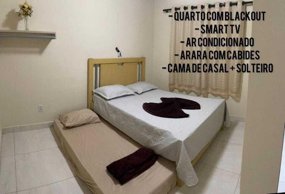 Flat na área central com AR-garagem-wifi-confortável Apartment in Governador Valadares