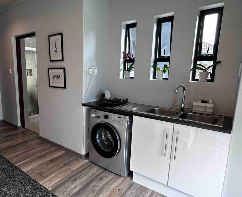 Kitchen or kitchenette, washing machine