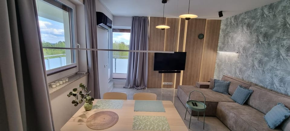 62m2 Apartament PREMIUM Łąki i Pola, ELEKTRYCZNE ROLETY, KLIMATYZACJA, GARAŻ, ŁADOWARKA AUT ELEKTRYCZNYCH Apartment in Lithuania
