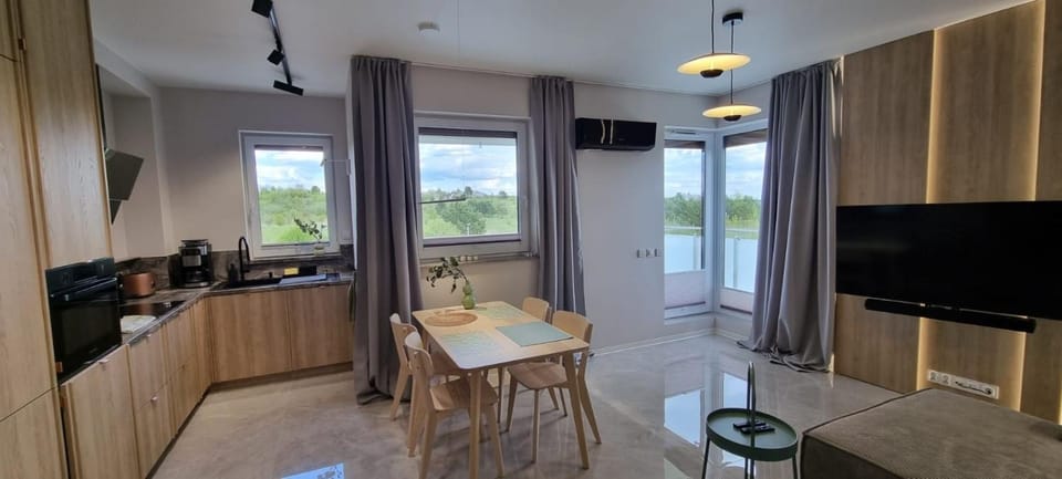 62m2 Apartament PREMIUM Łąki i Pola, ELEKTRYCZNE ROLETY, KLIMATYZACJA, GARAŻ, ŁADOWARKA AUT ELEKTRYCZNYCH Apartment in Lithuania
