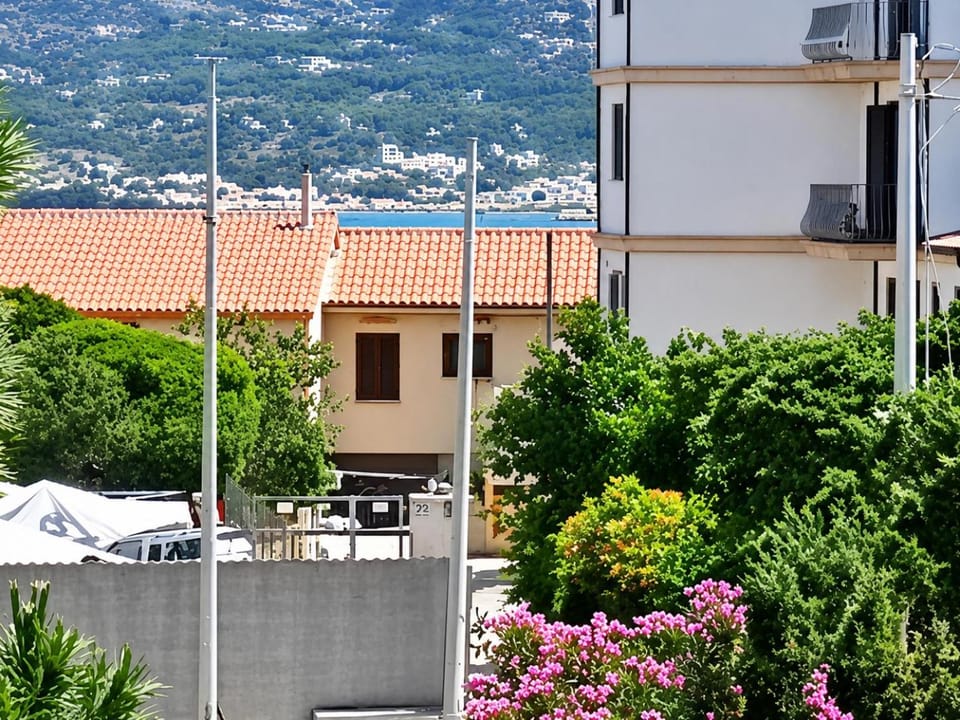 Property building, Day, Natural landscape, View (from property/room), Sea view