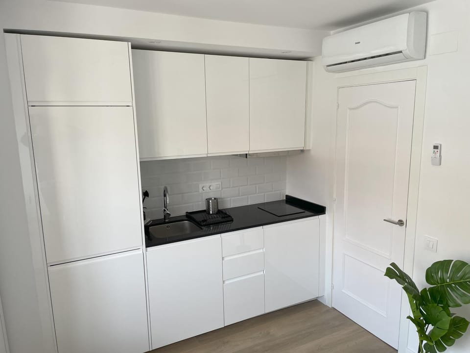 Kitchen or kitchenette, stove