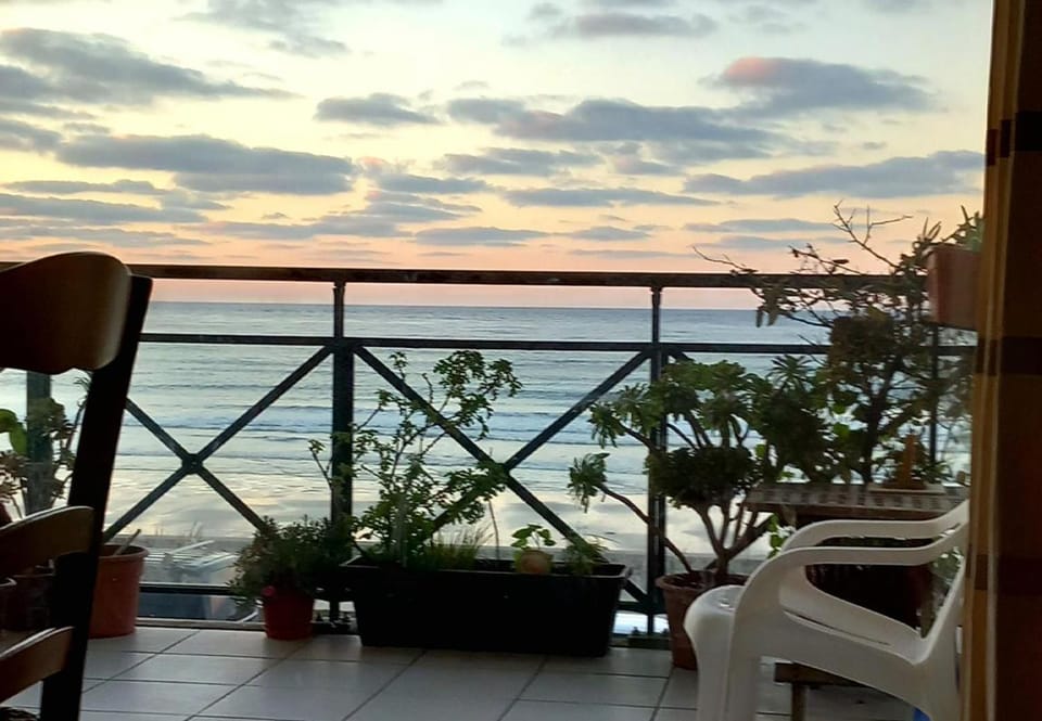 Natural landscape, View (from property/room), Living room, Seating area, Beach, Sea view