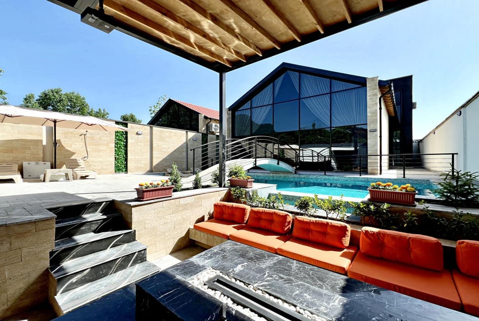 Property building, Patio, Communal lounge/ TV room, Day, Natural landscape, View (from property/room), Balcony/Terrace, Living room, Seating area, Evening entertainment, Pool view, Swimming pool, sunbed