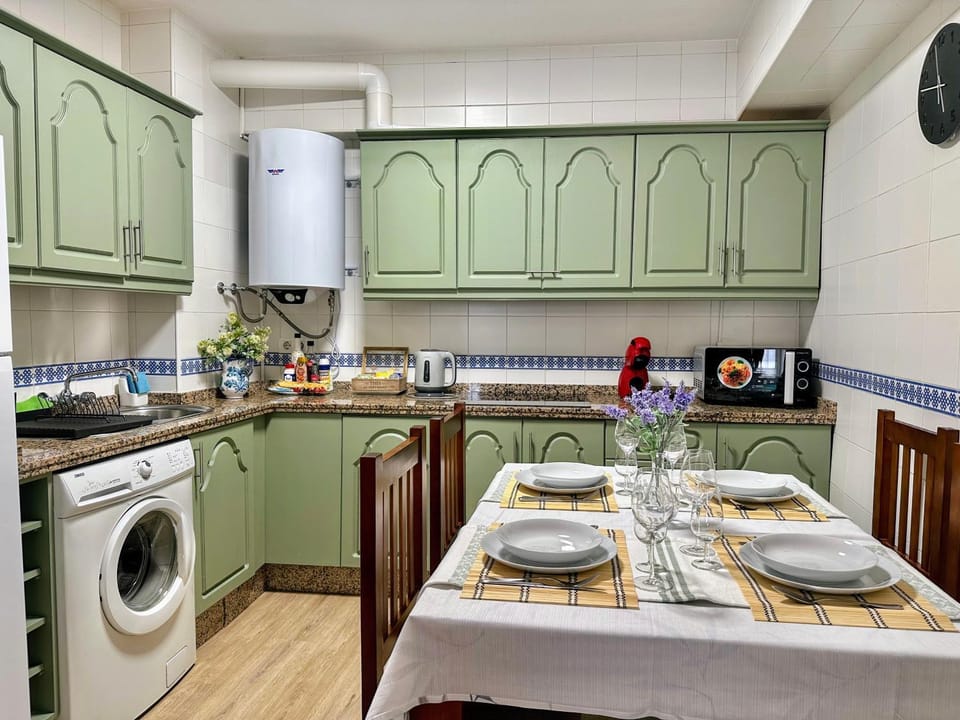Kitchen or kitchenette, washing machine
