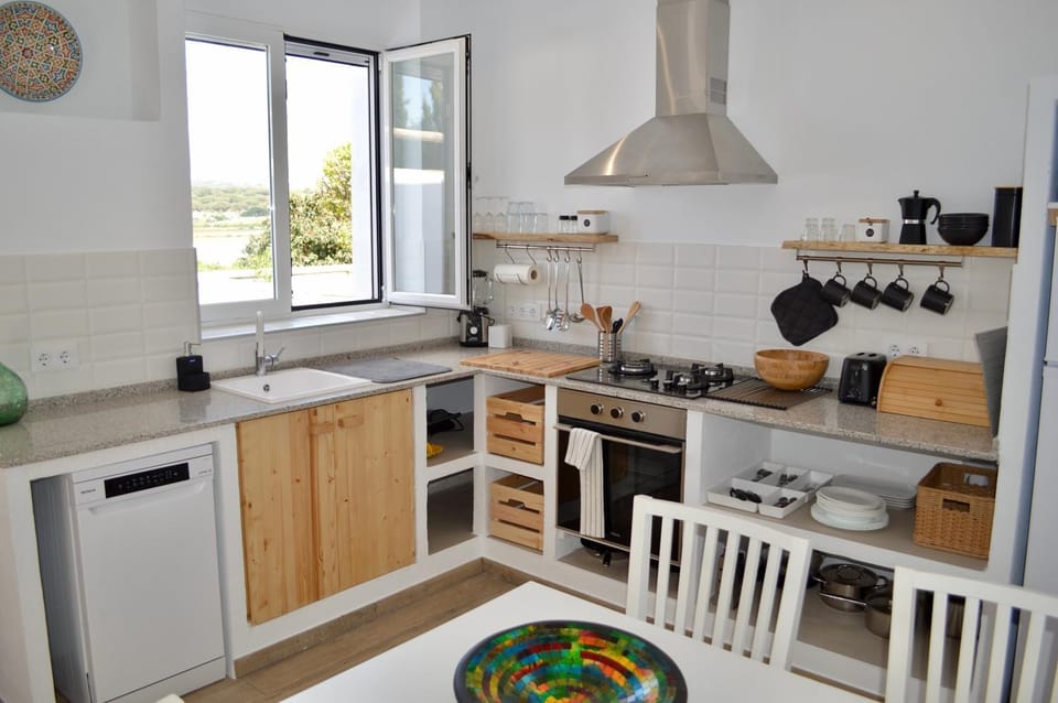 Kitchen or kitchenette, dishwasher, stove, toaster