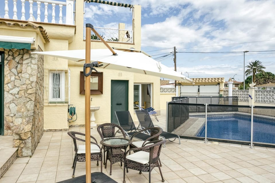 Property building, Living room, Swimming pool