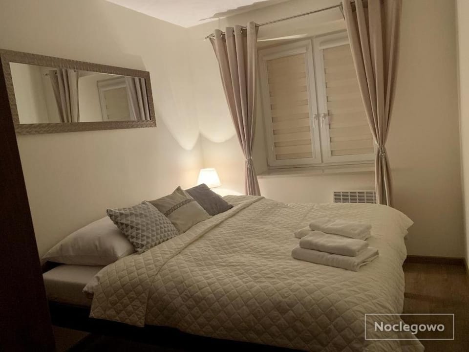Ostoja Nad Rzeką Apartment in Leba