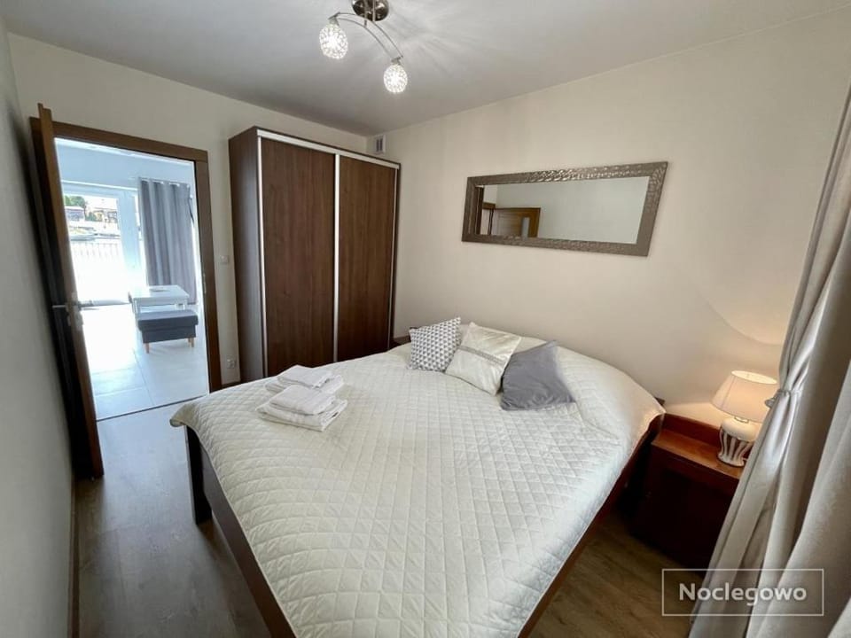 Ostoja Nad Rzeką Apartment in Leba