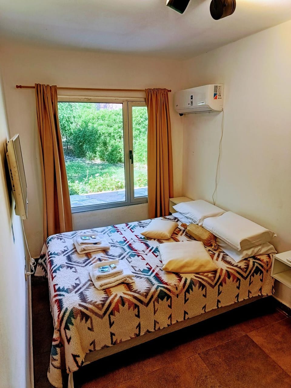 Photo of the whole room, Bedroom, towels, air conditioner