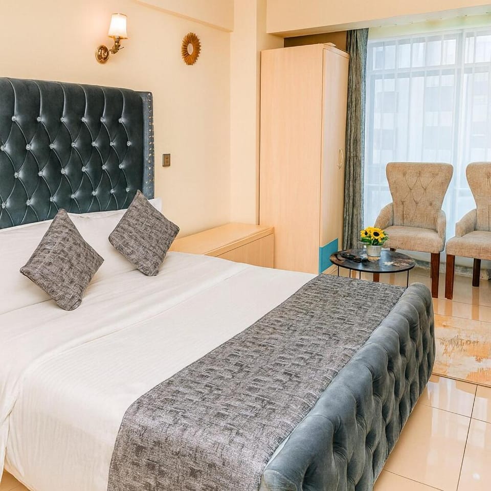 Bed, Living room, Seating area, Bedroom