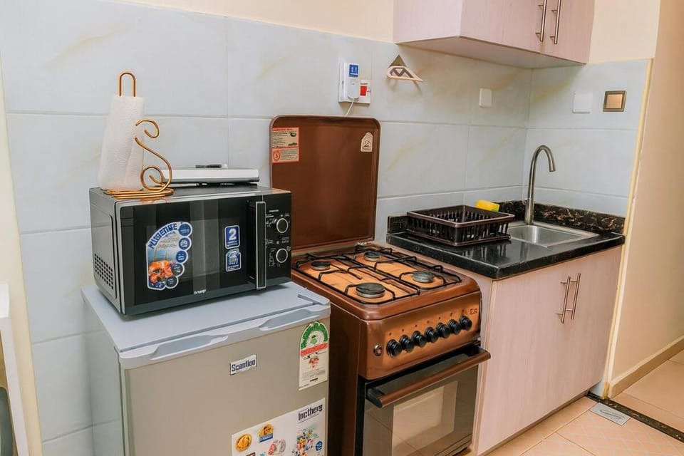 Kitchen or kitchenette, oven, stove