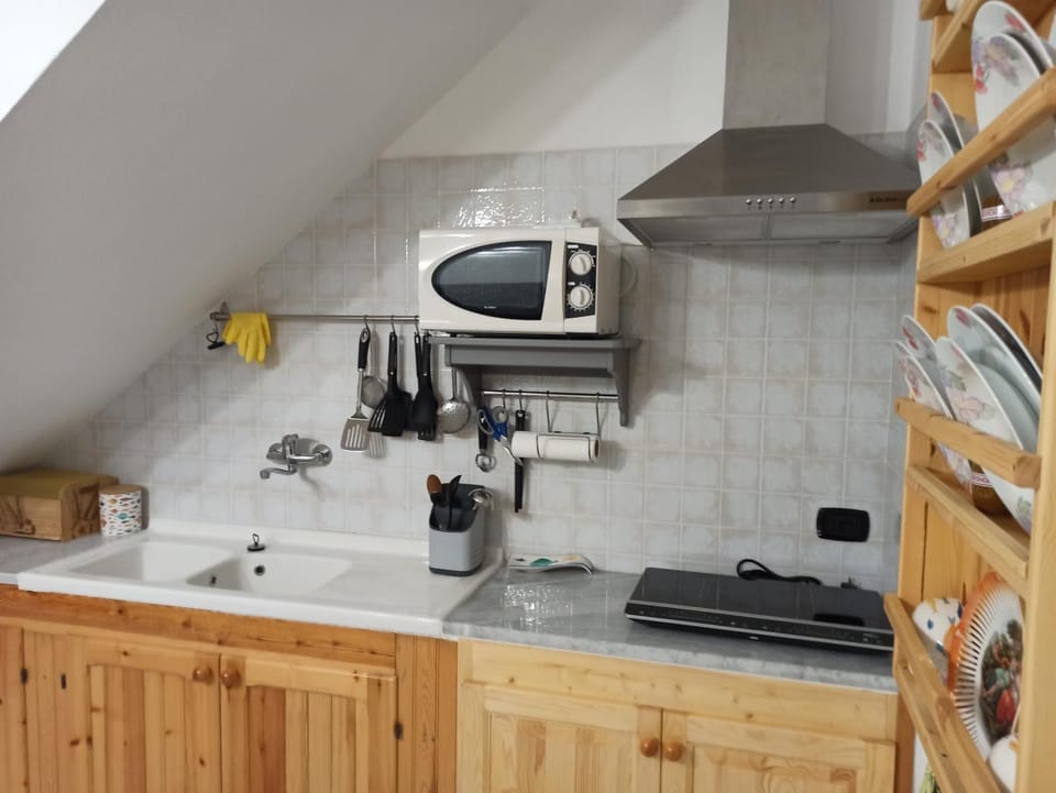 Kitchen or kitchenette, stove