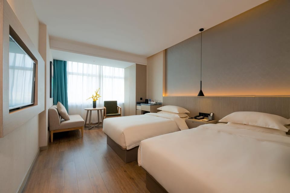义乌曼卡兰酒店国际商贸城店Yiwu kaiding Hotel Hotel in Hangzhou