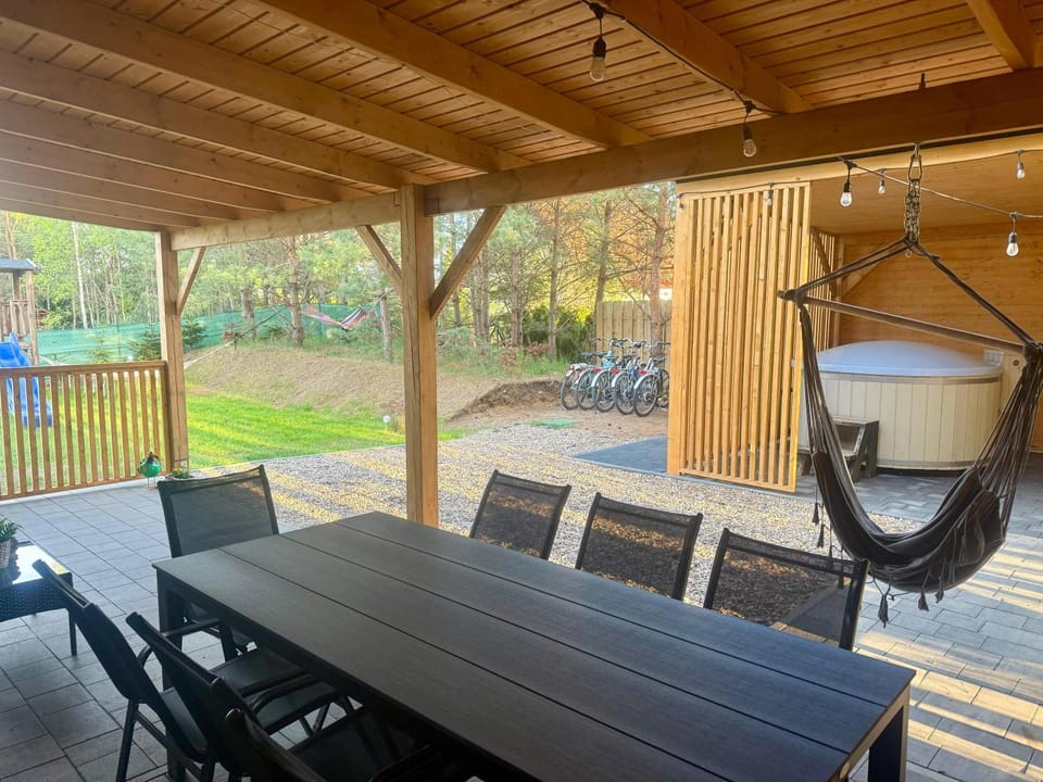 KASZUBY Oliwkowy domek Niesiołowice na Kaszubach Balia z Jacuzzi Jeziora lasy House in Pomeranian Voivodeship