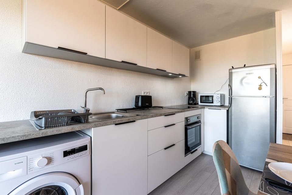 Kitchen or kitchenette, stove