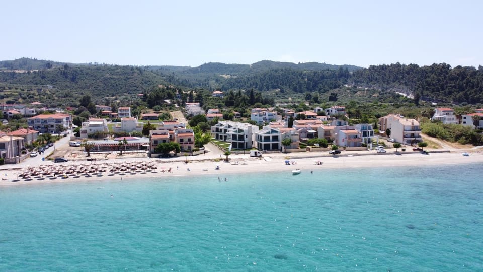 Property building, Day, Natural landscape, Bird's eye view, Beach, City view, Mountain view