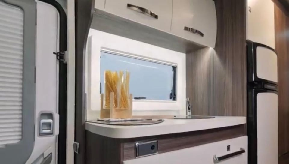 Portugals Infinity - AutoCaravana Luxo Docked boat in Faro